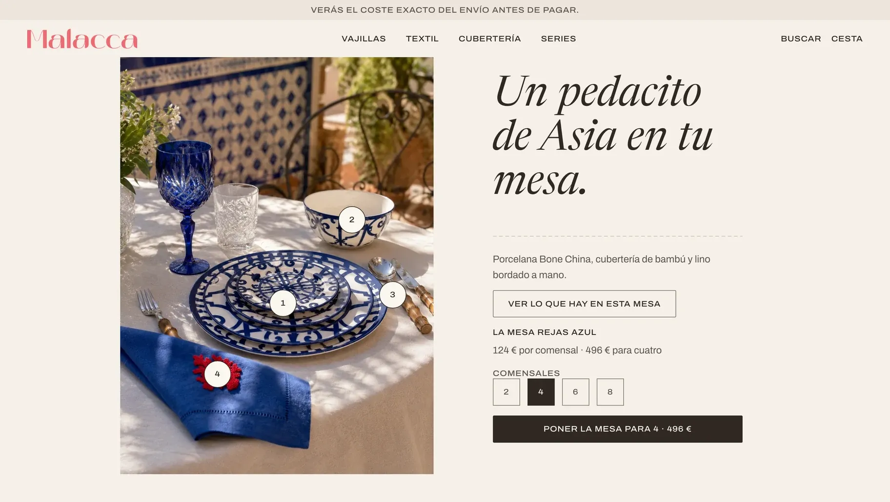 Home page of malacca.es: the headline Un pedacito de Asia en tu mesa beside a table set with blue and white porcelain, a blue glass and an embroidered napkin.